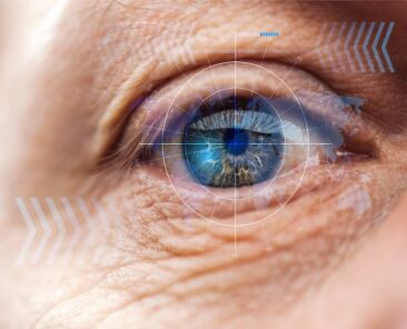 close up view of mature human eye with data illustration, robotic concept