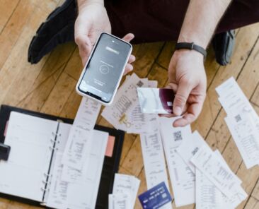 Man paying bills online via internet banking mockup